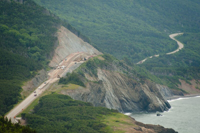Road Construction on Cliff stock photo. Image of digging 93317430