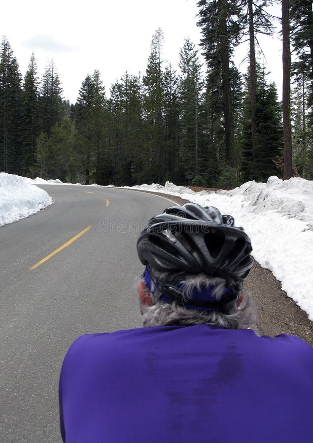 Road cyclist in snow