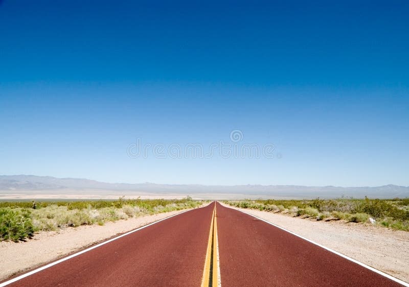 Road in the desert stock photography