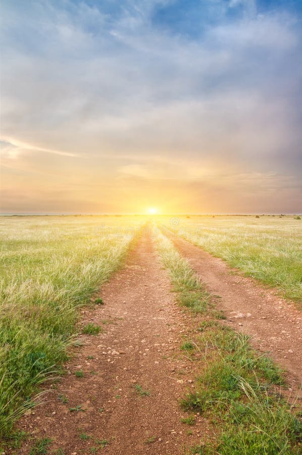 Road on green meadow stock image. Image of grassland 20046201