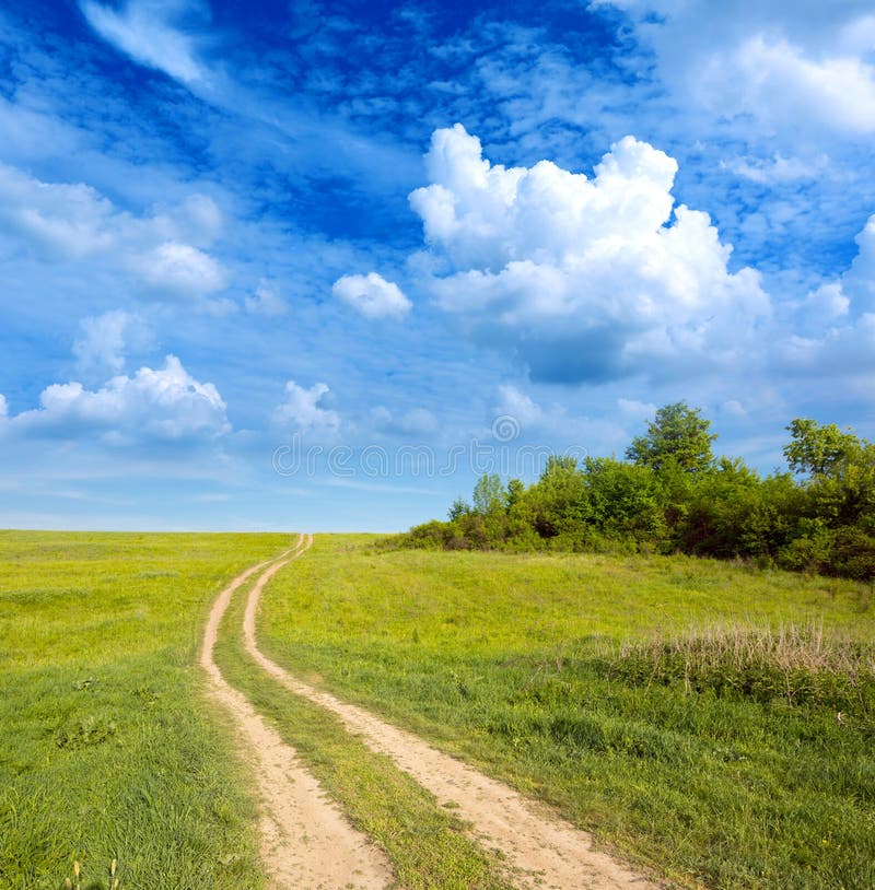 Road on green meadow stock photo. Image of green, landscape 35414212