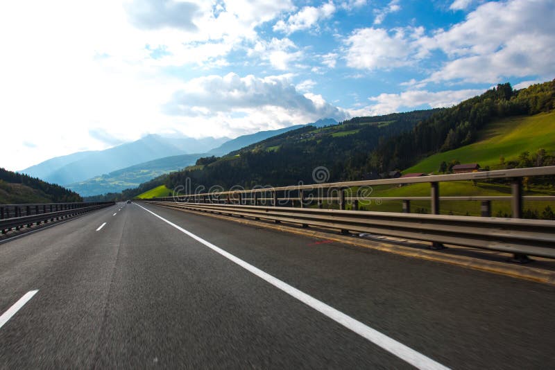 Road, Green Meadows, Blue Sky Stock Photo Image of horizon, field