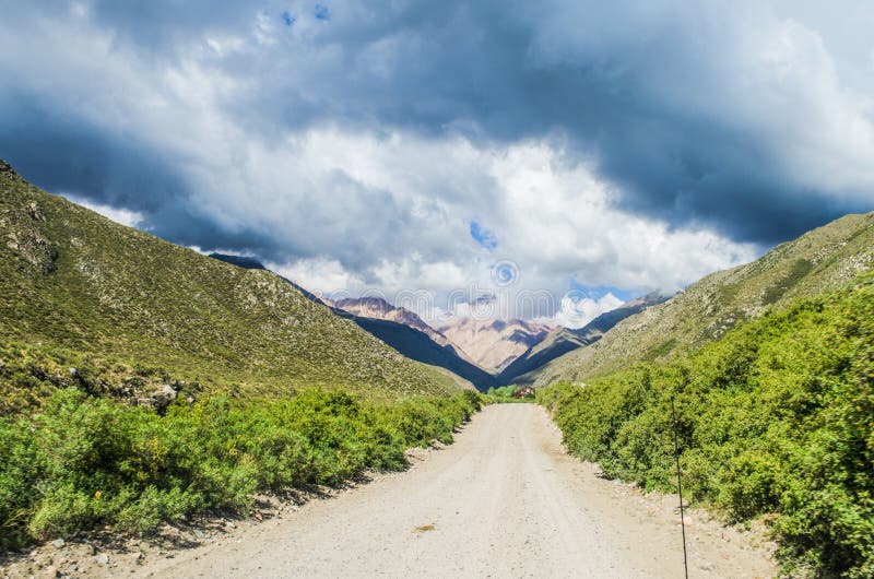 Road among the Mesmerizing Andes Mountains in Argentina Stock Photo