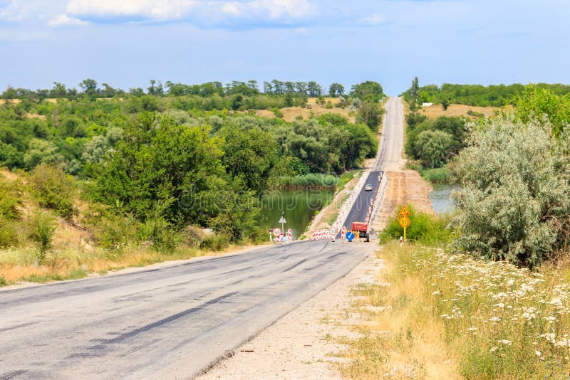 Road Repair on Dam Across the Small River Stock Image Image of gravel