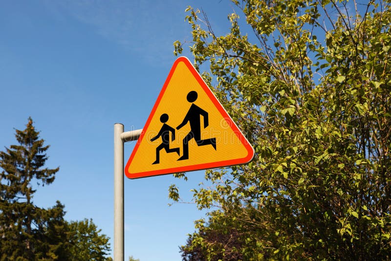 Road sign Children outdoors on sunny day royalty free stock photo