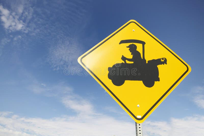 Road sign with senior driving golf cart. stock photography Road sign with senior driving golf cart. stock photography