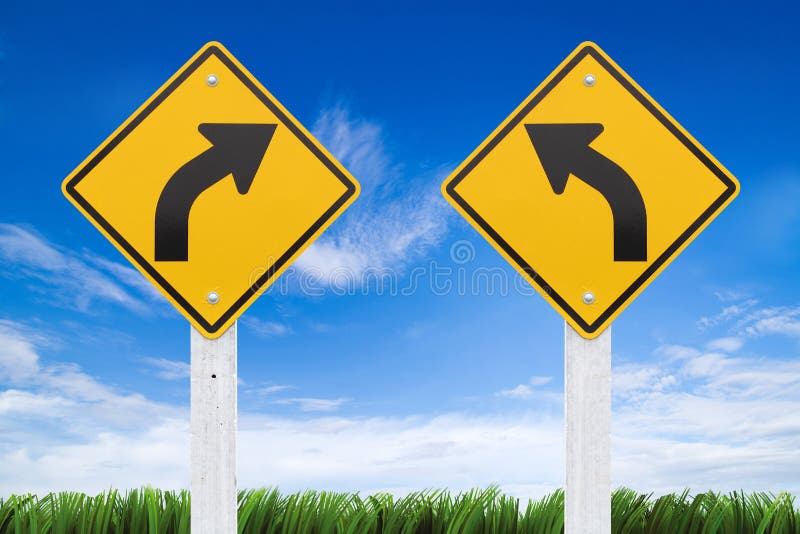 Road signs, right or left curve on sky background. (Clipping Pa