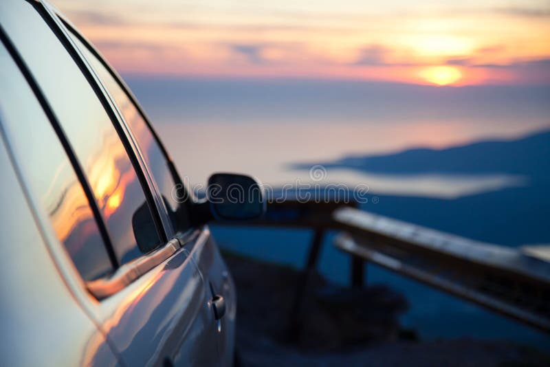 Road trip by car at sunset. Parking on roadside of narrow mountain way. Stop for rest. royalty free stock photos Road trip by car at sunset. Parking on roadside of narrow mountain way. Stop for rest. royalty free stock photos