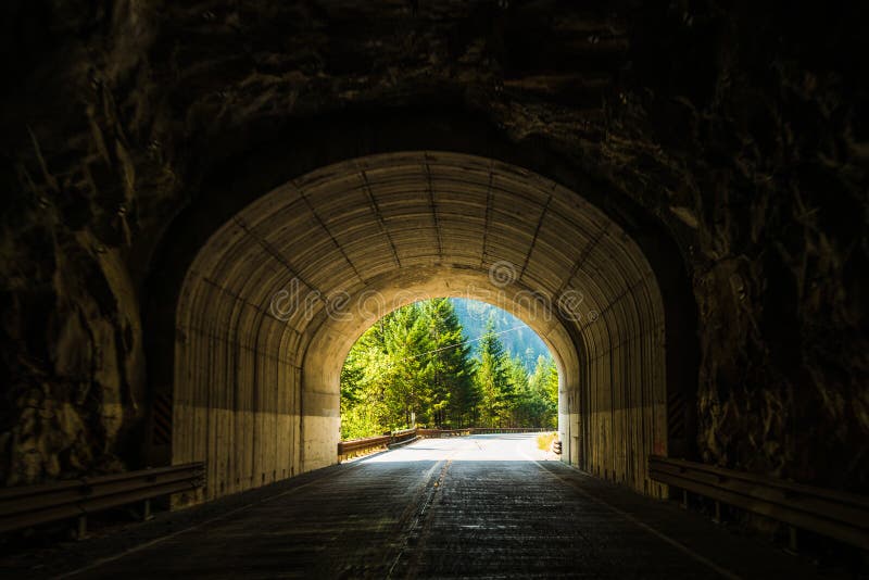 Road Tunnel ,Mountain Tunnel Through The Rock Mountain. Stock Photo