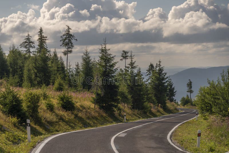 Road in Vysoke Tatry mountains in summer hot sunny day