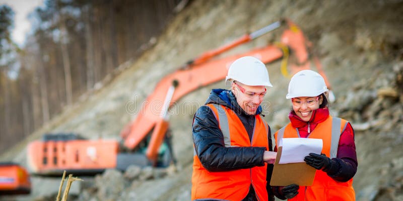 Road workers inspecting construction stock photography Road workers inspecting construction stock photography