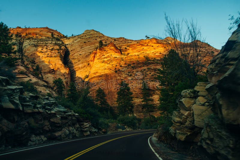 Road on Zion National Park is an American national park located in southwestern Utah near the town of Springdale. stock photo Road on Zion National Park is an American national park located in southwestern Utah near the town of Springdale. stock photo