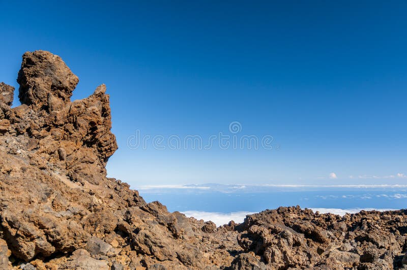 Roads and rocky lava of volcano Teide