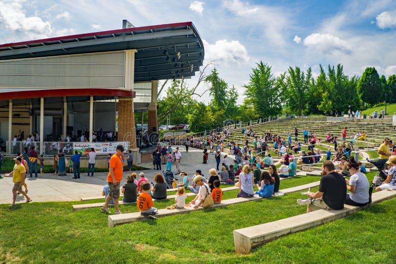 Roanoke, VA-May 4th: Families enjoy the music at annual Strawberry Festival located in the Elmwood Park in Roanoke, VA on the 4th of May 2019. Roanoke, VA-May 4th: Families enjoy the music at annual Strawberry Festival located in the Elmwood Park in Roanoke, VA on the 4th of May 2019.