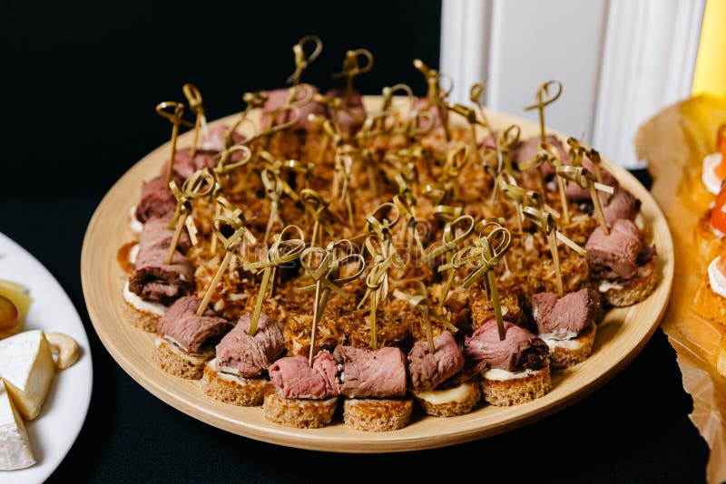 Roast Beef Canape on Skewers. Canape with Red Meat and Rye Bread ...
