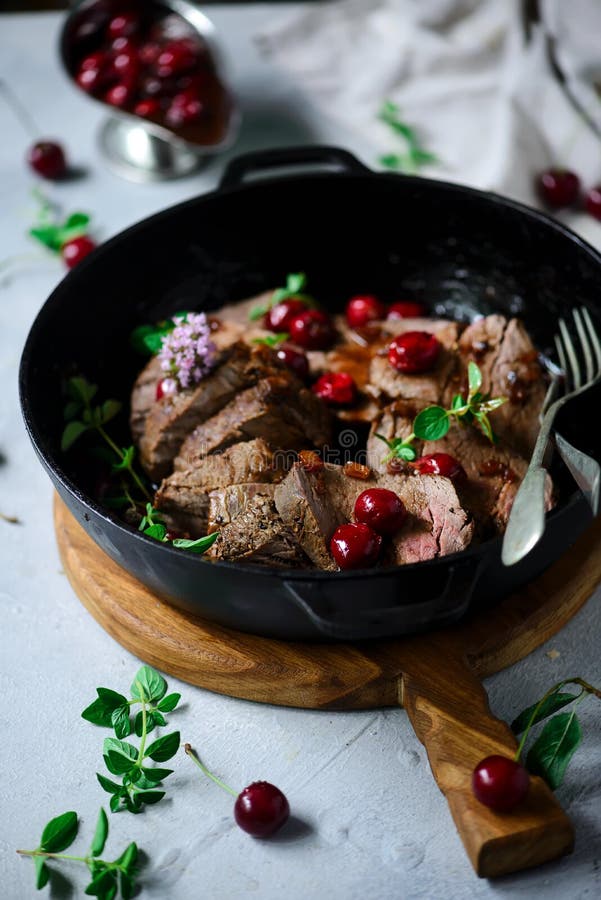 Roast Beef with Cherry Sauce.style Rustic Stock Photo Image of sauce
