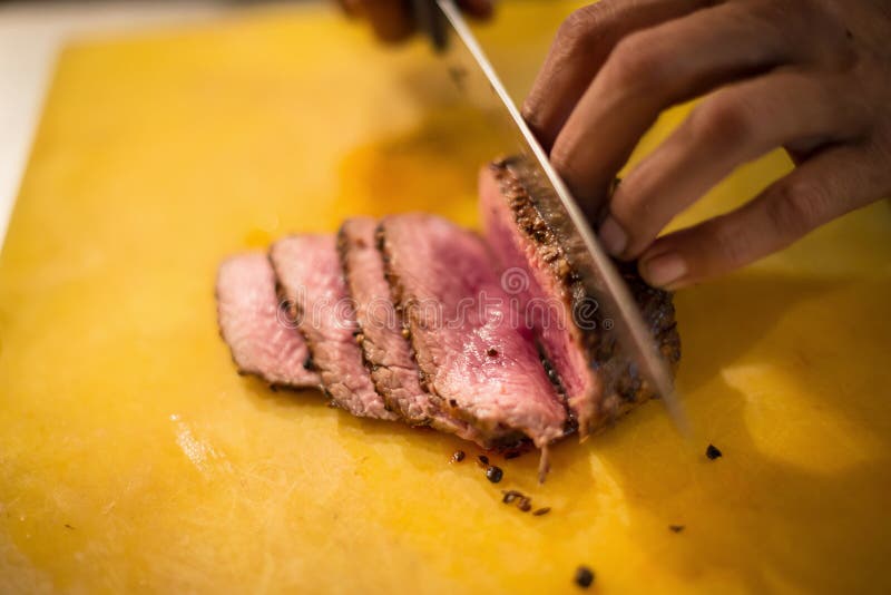 Roast Beef on Cutting Board and Knife. Stock Image Image of prime
