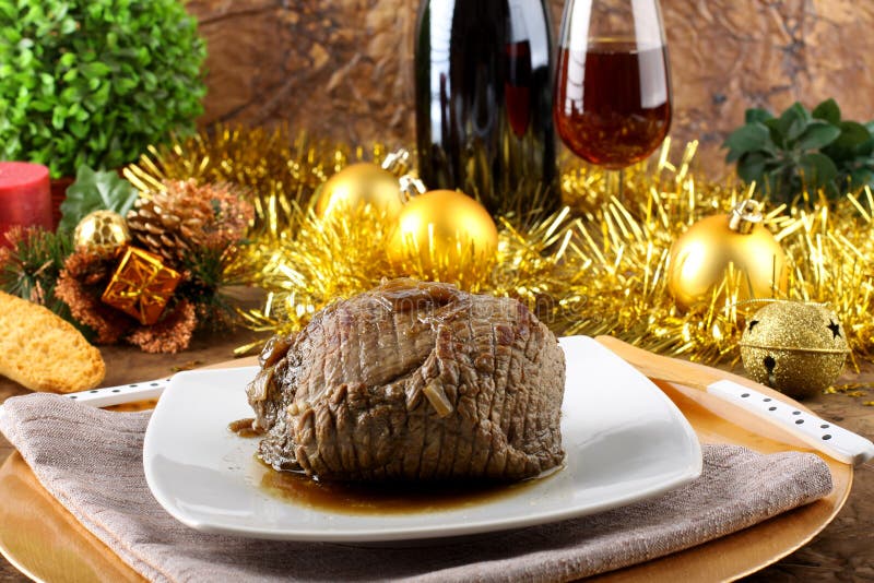 Roast beef with gravy stock image. Image of gold, knife 27720943