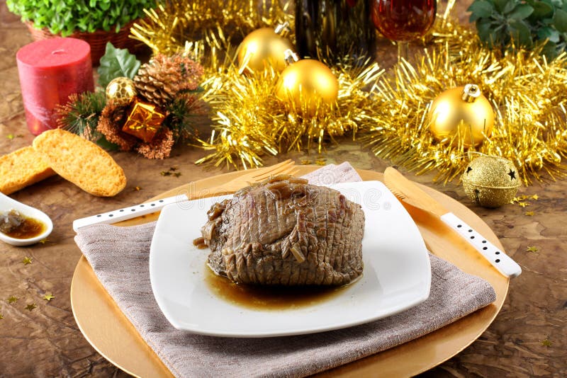 Roast beef with gravy stock image. Image of gold, knife 27720943