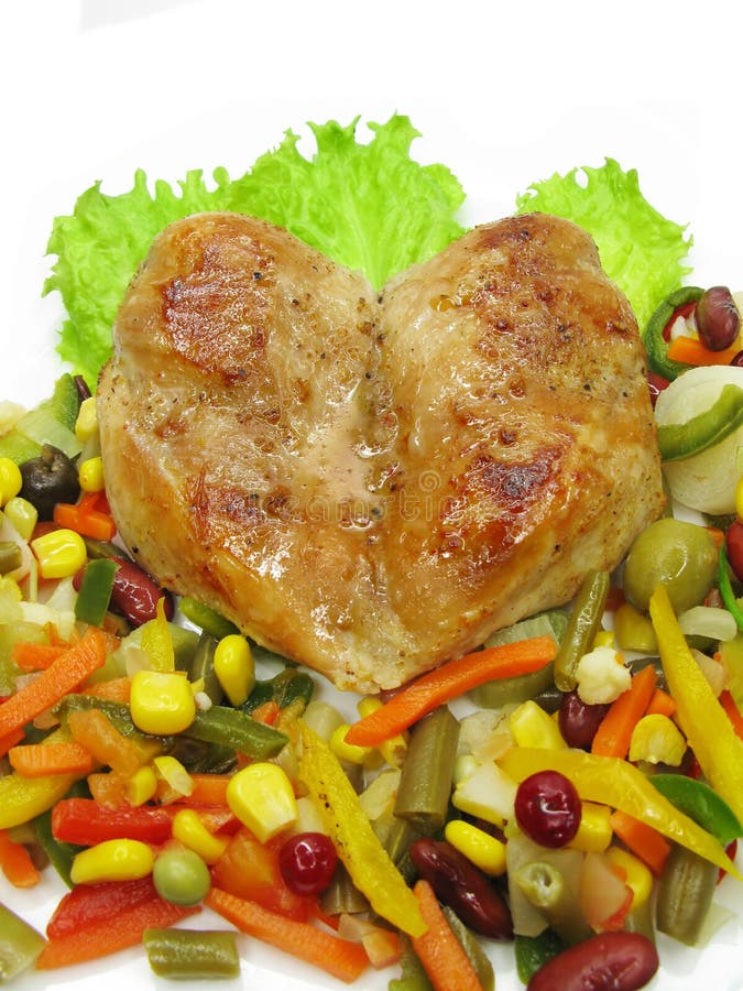 Roast beef meat with vegetables and spaghetti stock images