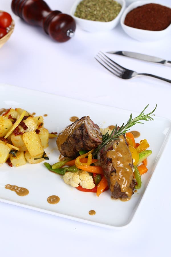 Roast beef with sauce stock photo. Image of dinner, flame 95890344