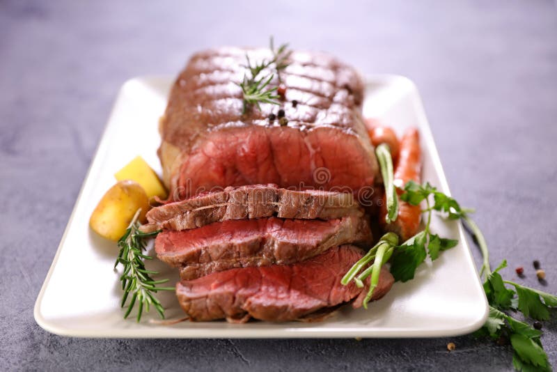 Roast beef slice stock image. Image of carrot, bloody 245330653