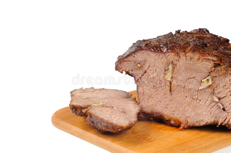 Roast beef on a wooden board