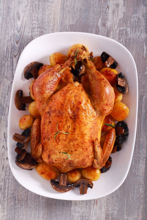Roast Chicken with Potatoes and Mushrooms Stock Photo Image of bake