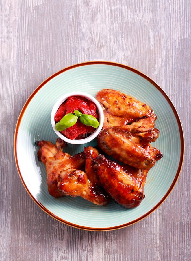Roast Chicken Wings and Tomato Sauce Stock Photo Image of grilled, appetizer 98680684