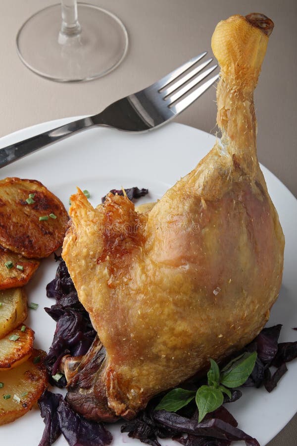 Roast duck leg stock photo. Image of meal, roasted, fork 18749542