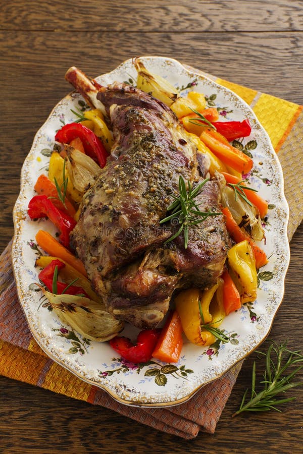 Roast Leg of Lamb with Rosemary and Garlic Stock Photo - Image of stew ...