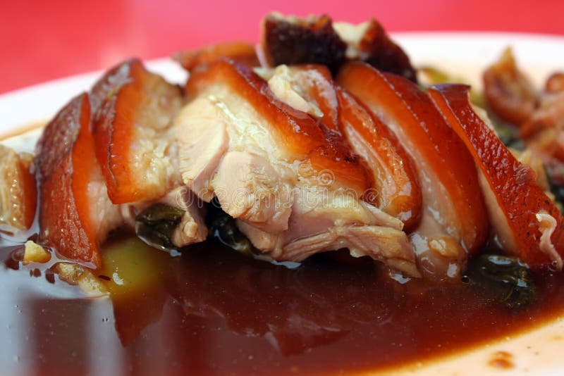 Slices of roast pork trotters that typically accompanies plain rice. Crispy diet stock images, royalty-free photos and pictures