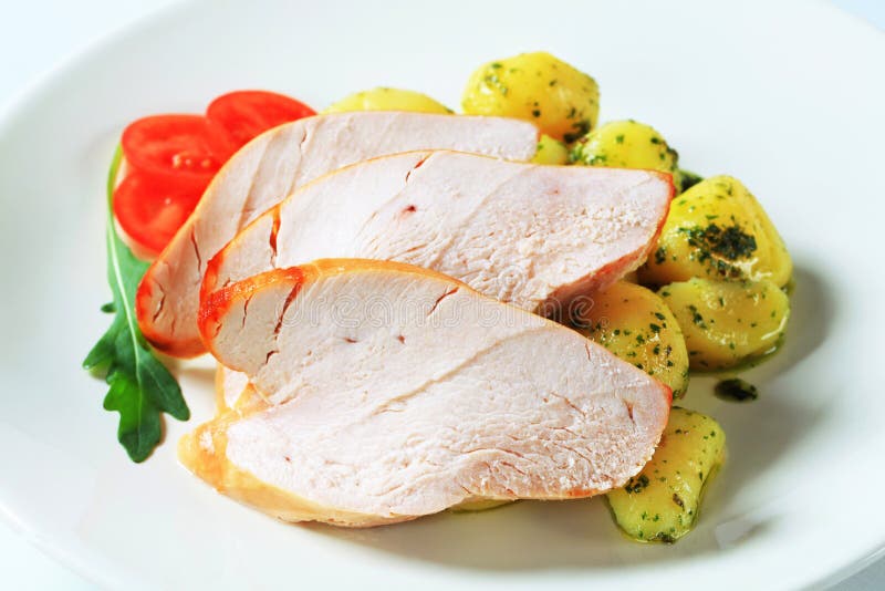 Roast turkey breast and potatoes