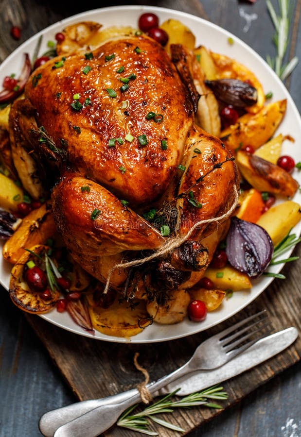 Roast Whole Chicken with Roast Vegetables on Plate on a Table Stock Photo Image of recipe