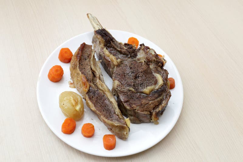 Roasted beef on the bone stock image. Image of homemade 53109661
