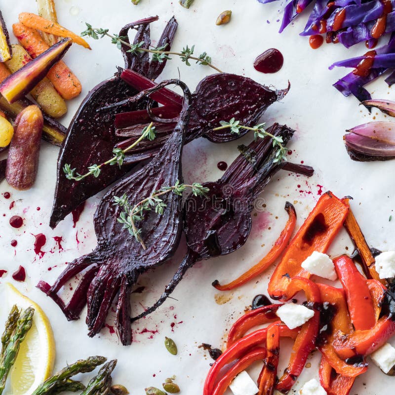 Roasted Beets with Thyme on Parchment Paper Along with Other Assorted