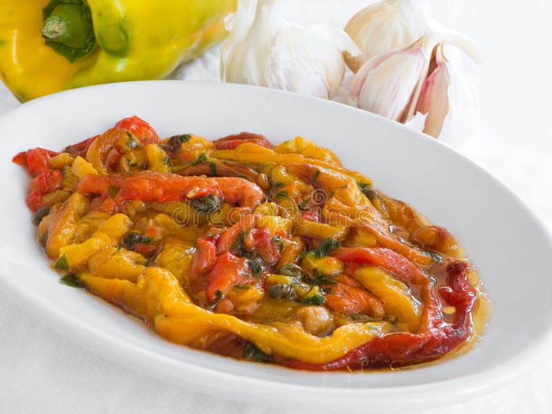 Roasted Bell Pepper Salad on White Dish. Stock Photo Image of garlic