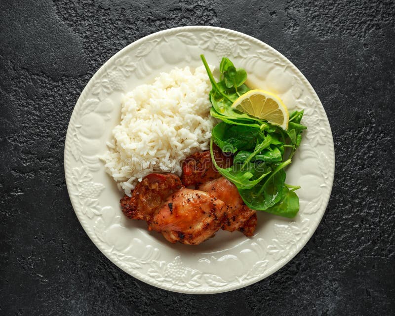 Roasted Boneless Skinless Chicken Thighs with Rice and Green Vegetables