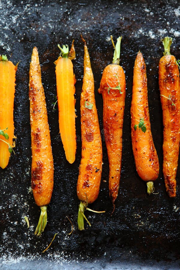 Roasted Carrots stock image. Image of broccoli, carrots 73197183