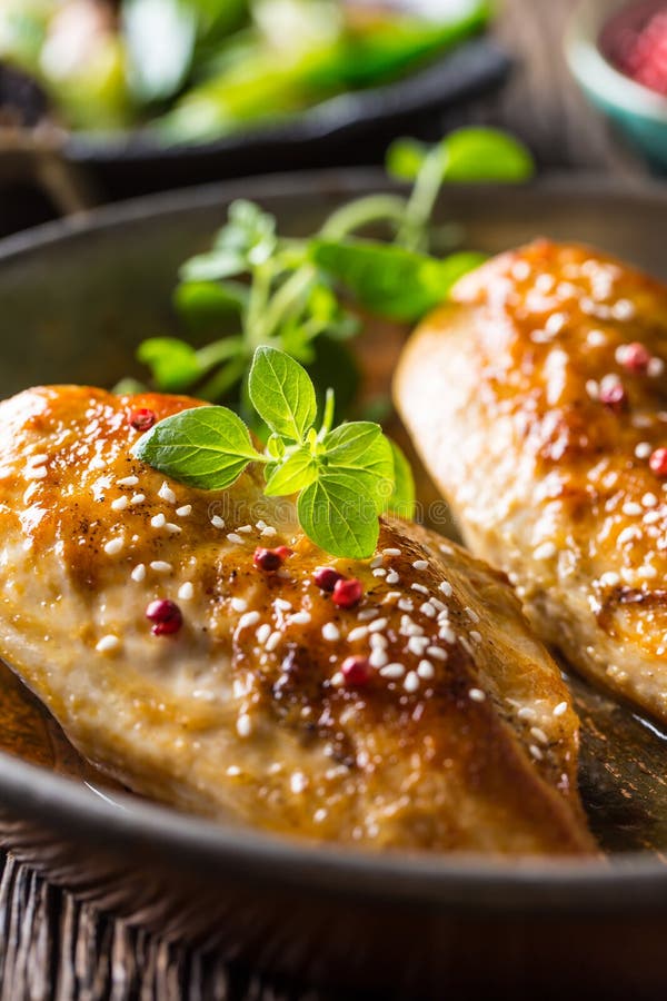 Roasted Chicken Breast Sesame Oregano and Pepper in Pan Stock Image