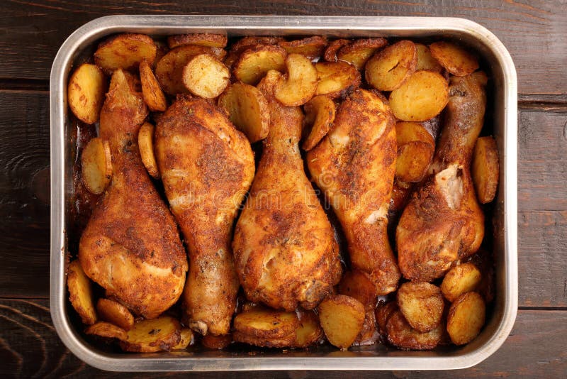 Roasted Chicken Legs with Potato Chips Stock Photo Image of chicken