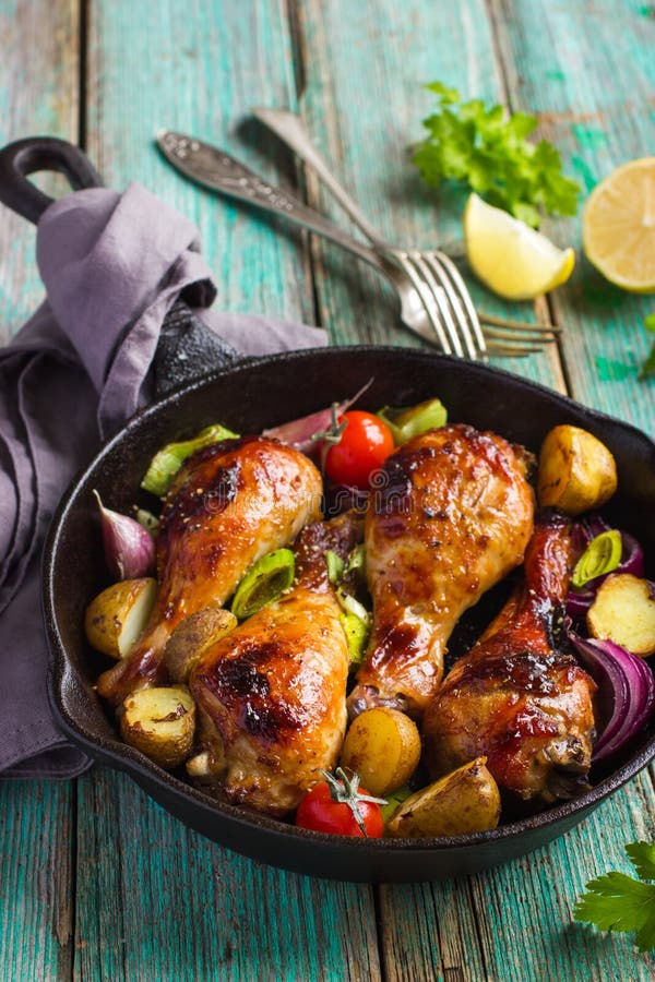 Baked Chicken Legs with Mushrooms and Vegetables. Horizontal Top Stock