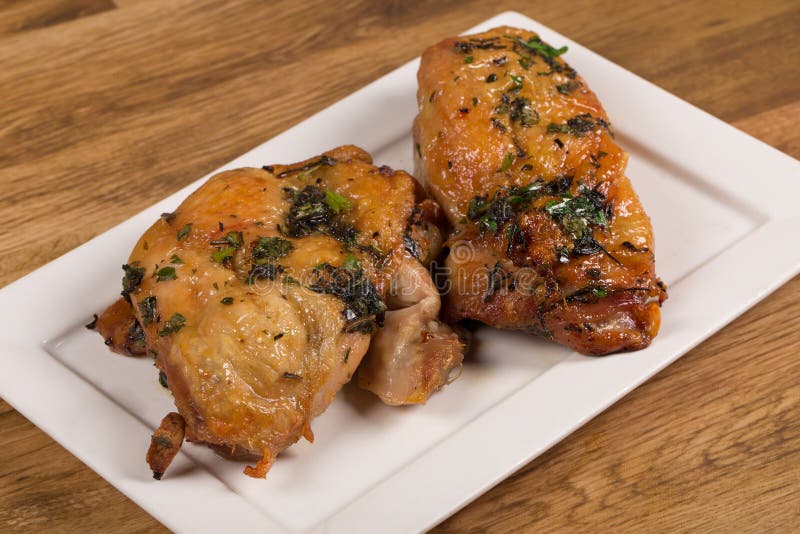 Roasted Chicken Thighs with Spices and Herbs Stock Photo - Image of ...