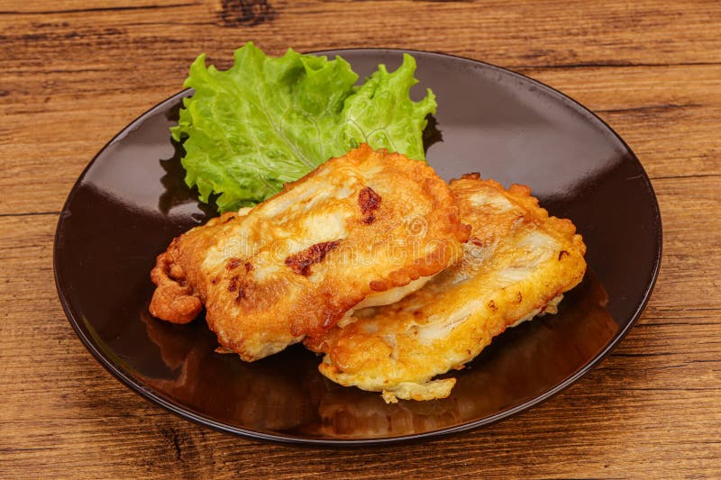 Roasted cod fish in bread stock photo. Image of breaded 192251698