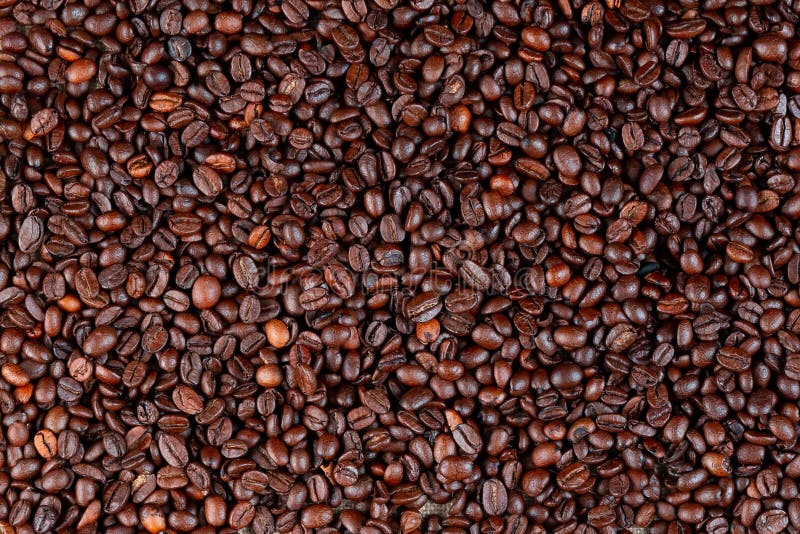 Roasted coffee beans close up from above