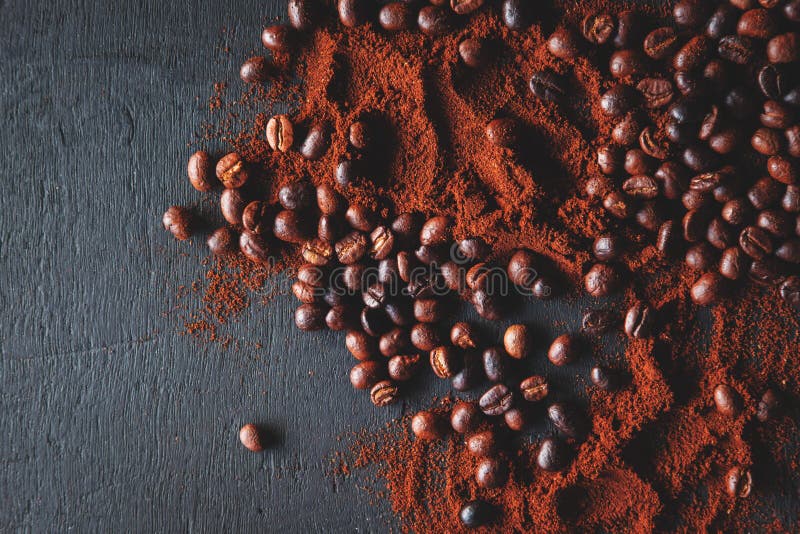 .Roasted Coffee Beans with Coffee Powder and Coffee Cups Stock Image