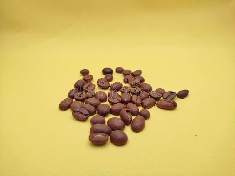 Roasted Coffee Beans on Yellow Background Stock Photo Image of coffee