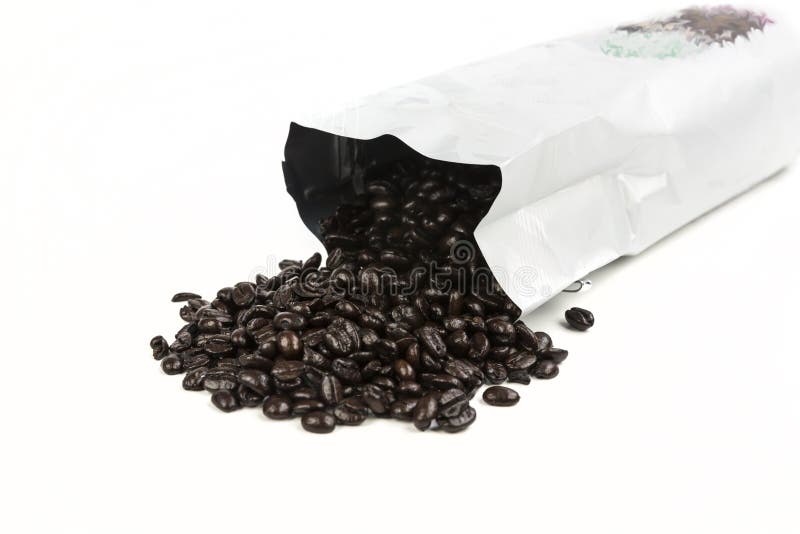 Roasted Coffee Beans Spilling from a Bag with a Colored Pattern on it