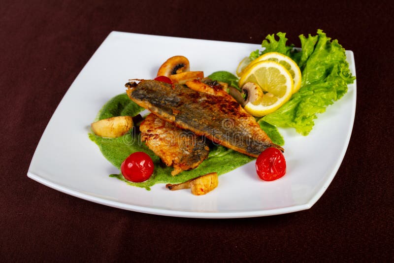 Roasted Dorado fish fillet stock photo. Image of closeup 129517272