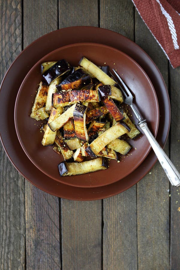 Roasted Eggplant Cut into Pieces Stock Photo Image of fork, frying